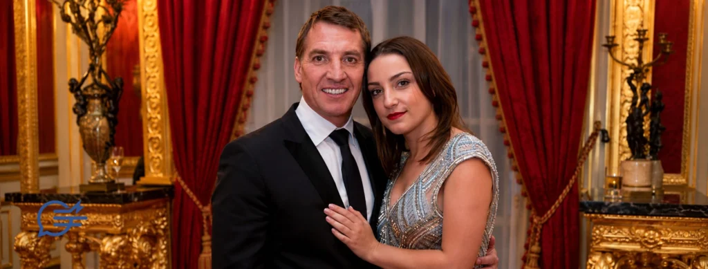 Football manager Brendan Rodgers posing with his daughter Mischa Rodgers at a formal event, wearing evening attire.