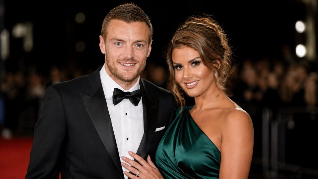 Rebekah Vardy: The Woman Britain Turned Into a Verb Rebekah Vardy and her husband Jamie Vardy posing together at a glamorous red carpet event in formal evening attire.